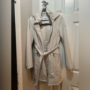 Guess women’s hooded and belted overcoat. Size small. Cream colored.